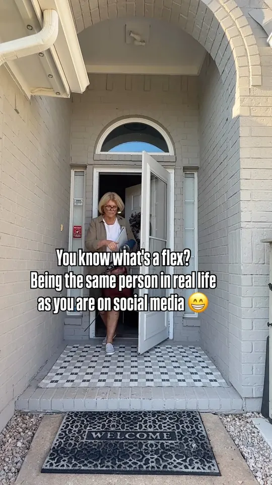 Ann stepping out of an arched front door, with the caption: being the same person in real life as you are on social media